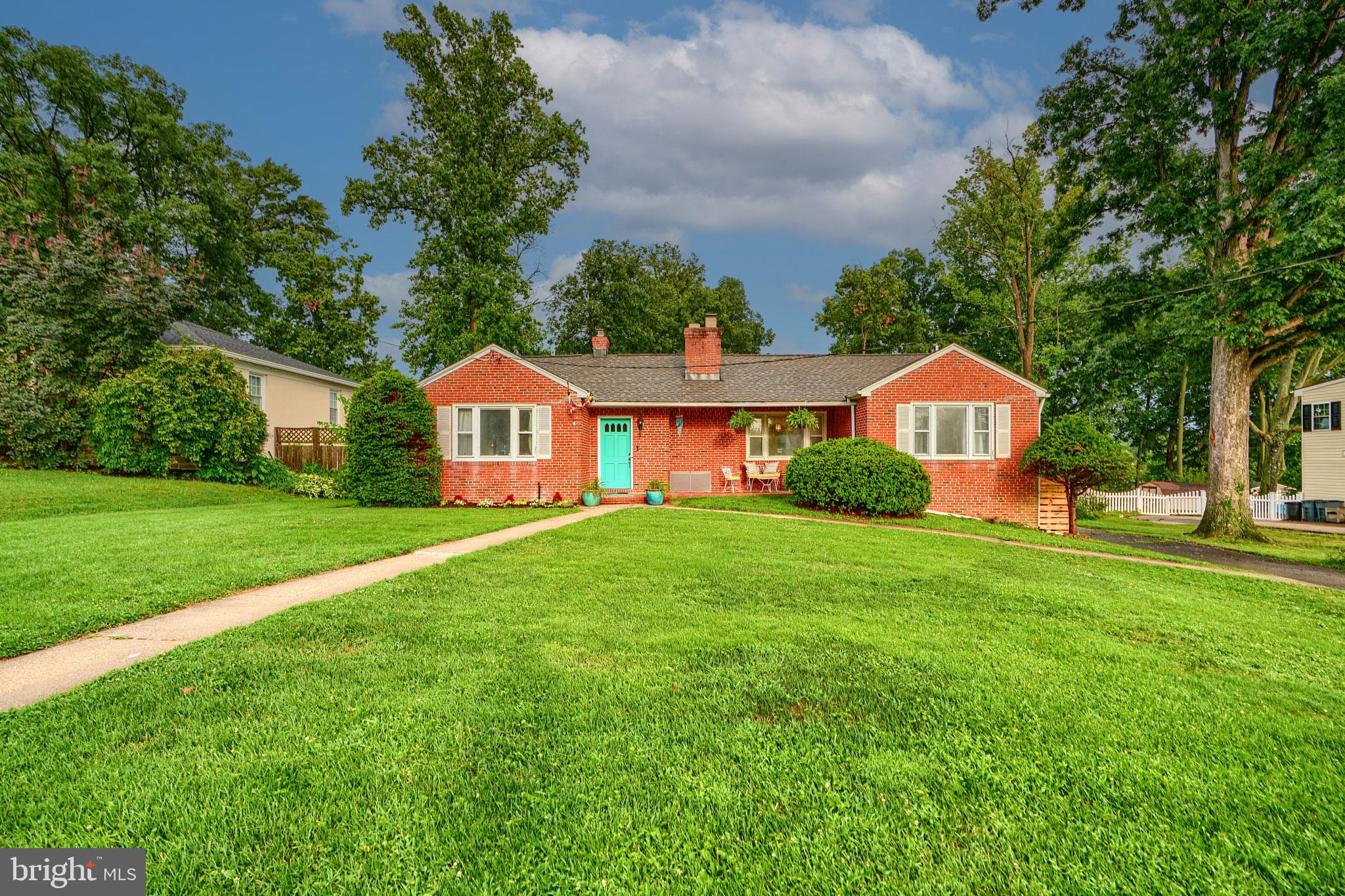 231 Gralan Road Catonsville, MD 21228 - Photo 3 of 37 a front view of a house with a yard and porch