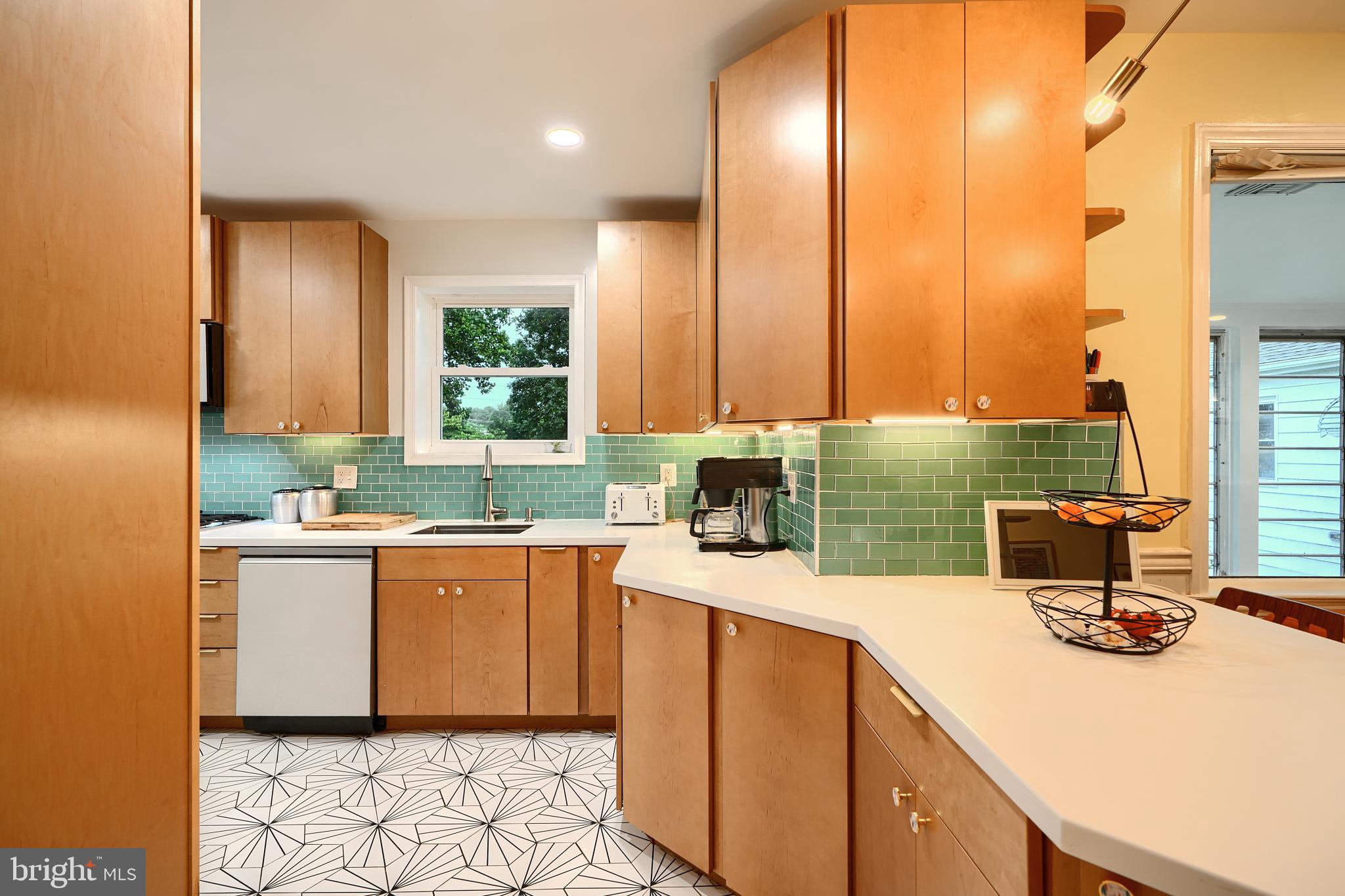 231 Gralan Road Catonsville, MD 21228 - Photo 7 of 37 a kitchen with a sink and cabinets