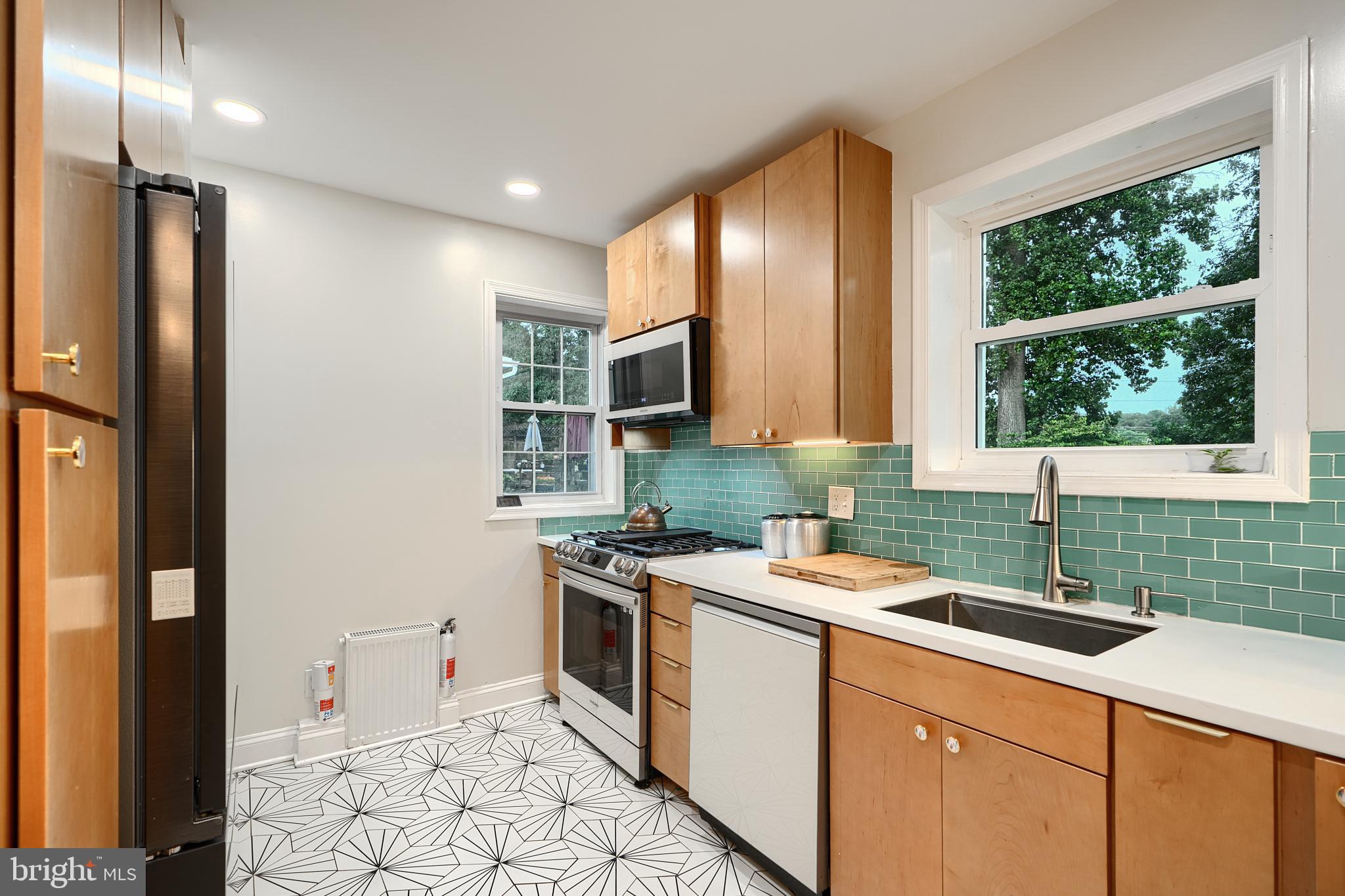 231 Gralan Road Catonsville, MD 21228 - Photo 9 of 37 a room with sink cabinets and appliances