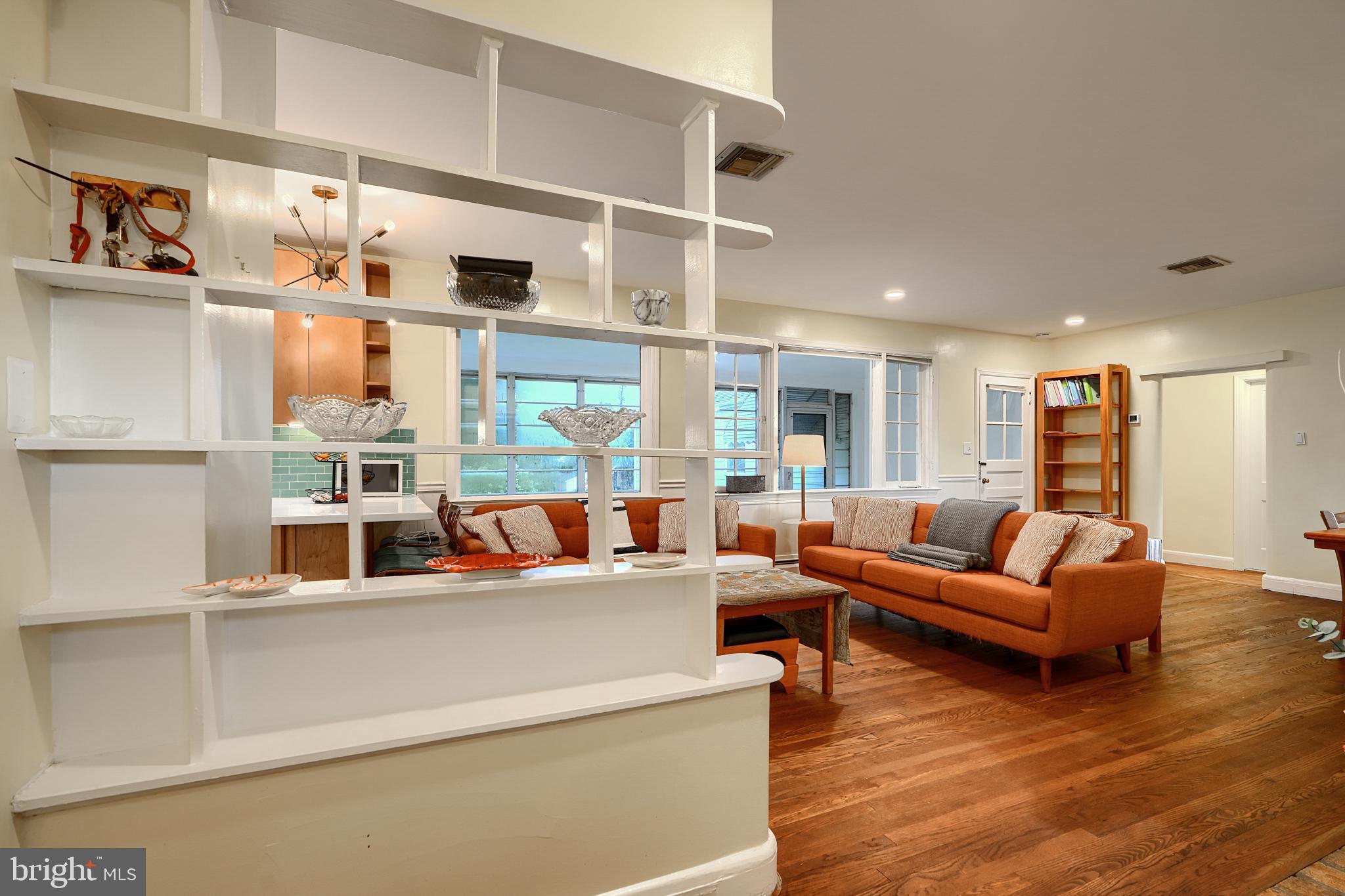 231 Gralan Road Catonsville, MD 21228 - Photo 10 of 37 a living room with furniture and a large window