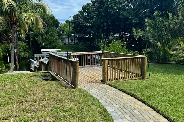 a view of deck with wooden floor and fence