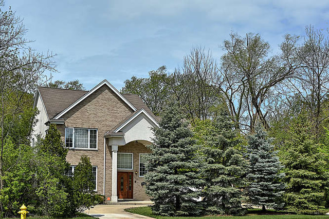 902 Greenwood Road Glenview, IL 60025 - Photo 1 of 1 a view of a house with a tree
