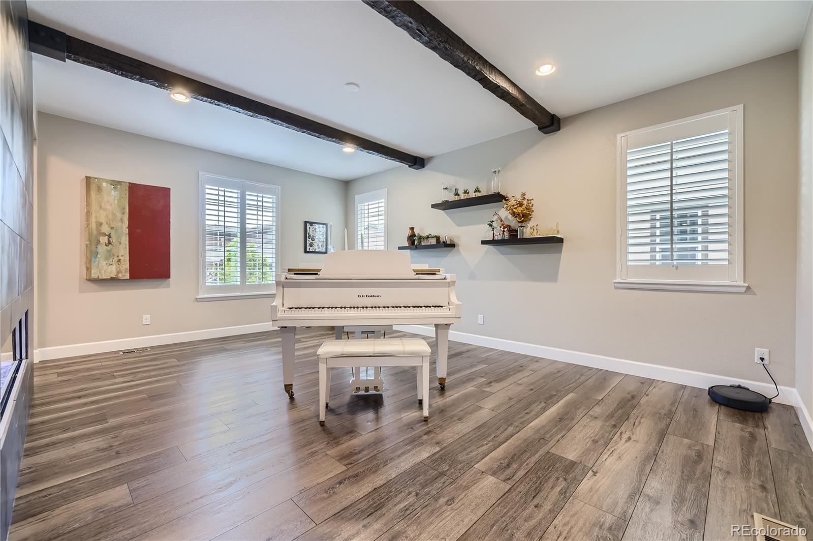 11330 Yellow Tip Point Parker, CO 80134 - Photo 15 of 50 a living room with a wooden floor