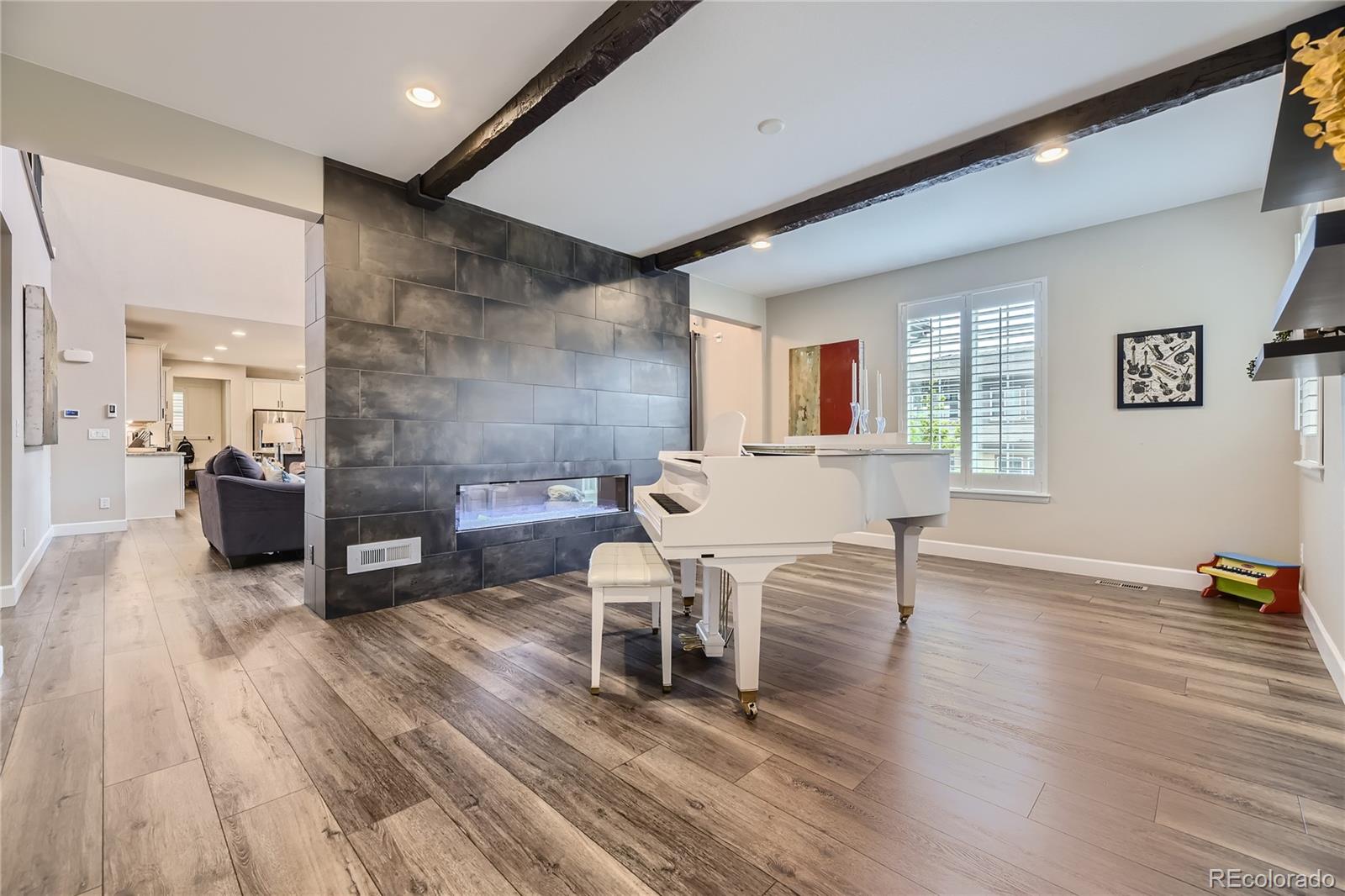 11330 Yellow Tip Point Parker, CO 80134 - Photo 16 of 50 a living room with furniture and a wooden floor