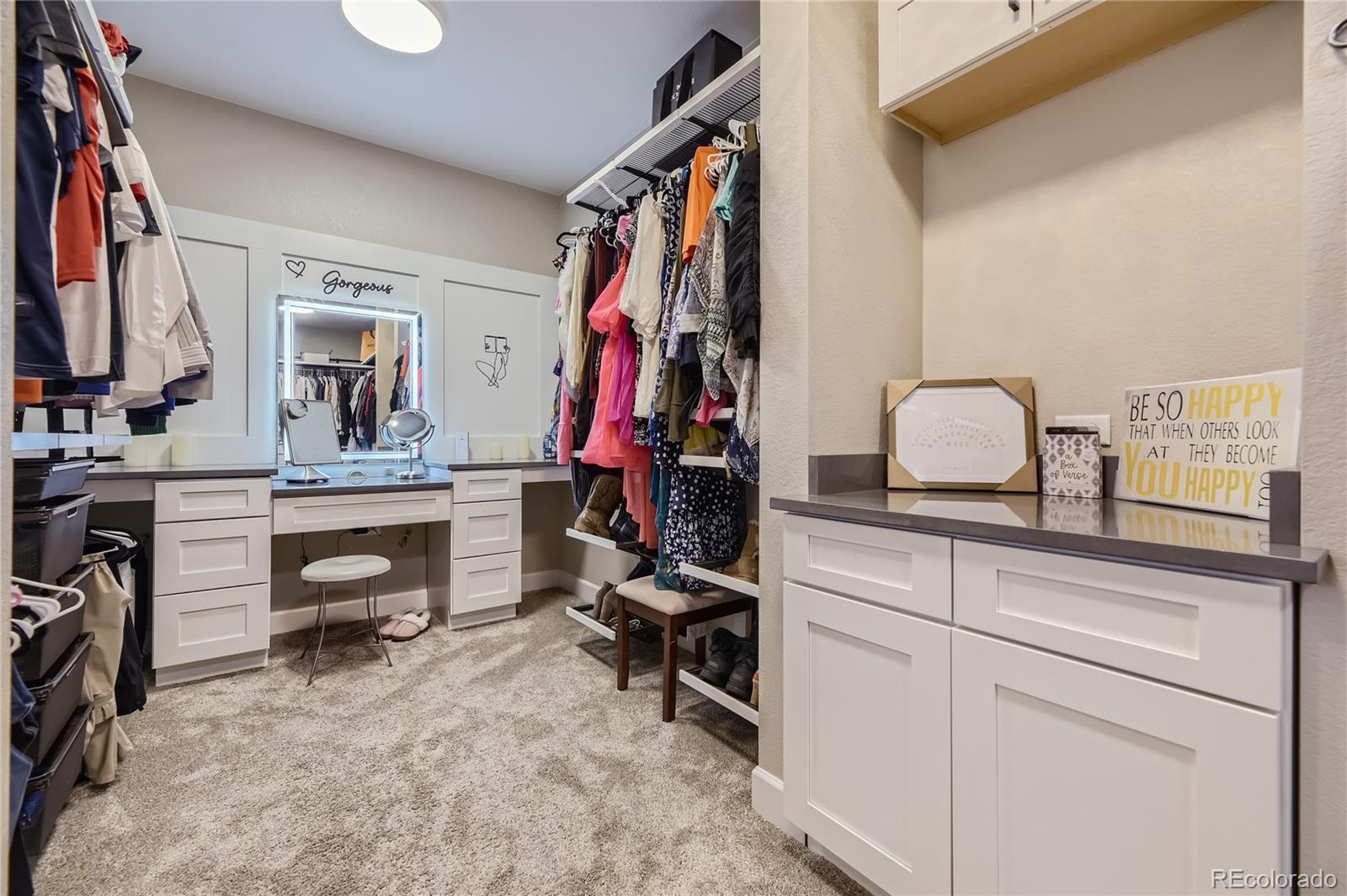 11330 Yellow Tip Point Parker, CO 80134 - Photo 27 of 50 a view of walk in closet with clothes and shoes