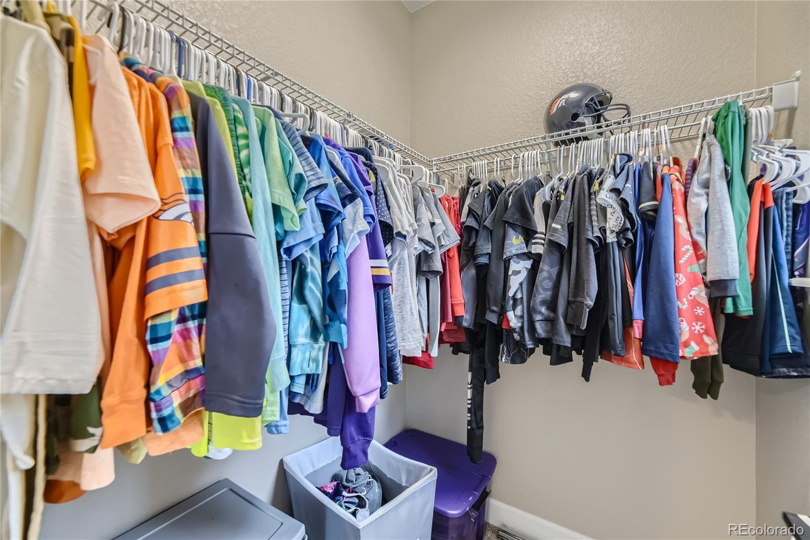 11330 Yellow Tip Point Parker, CO 80134 - Photo 37 of 50 a view of walk in closet with clothes