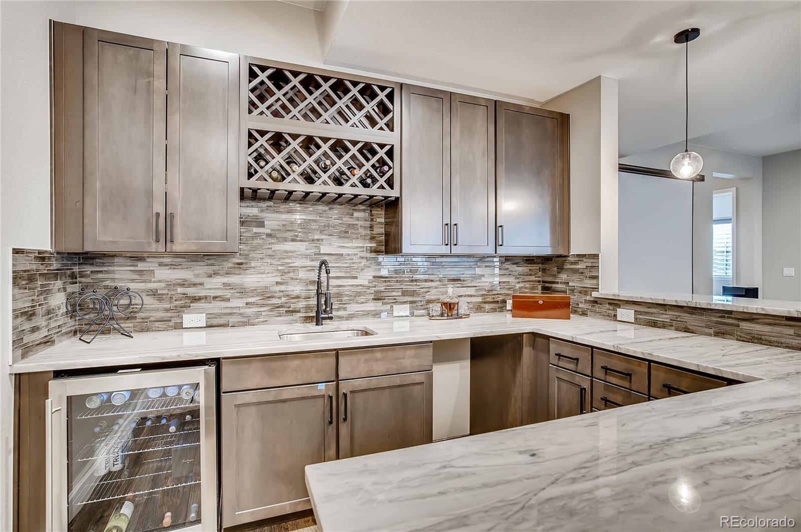 11330 Yellow Tip Point Parker, CO 80134 - Photo 40 of 50 a kitchen with a sink cabinets and window