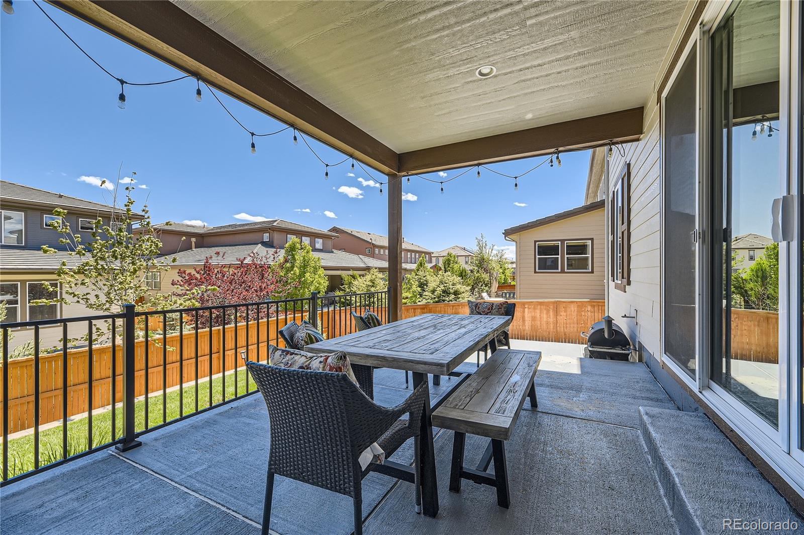 11330 Yellow Tip Point Parker, CO 80134 - Photo 46 of 50 a view of a patio with a table and chairs