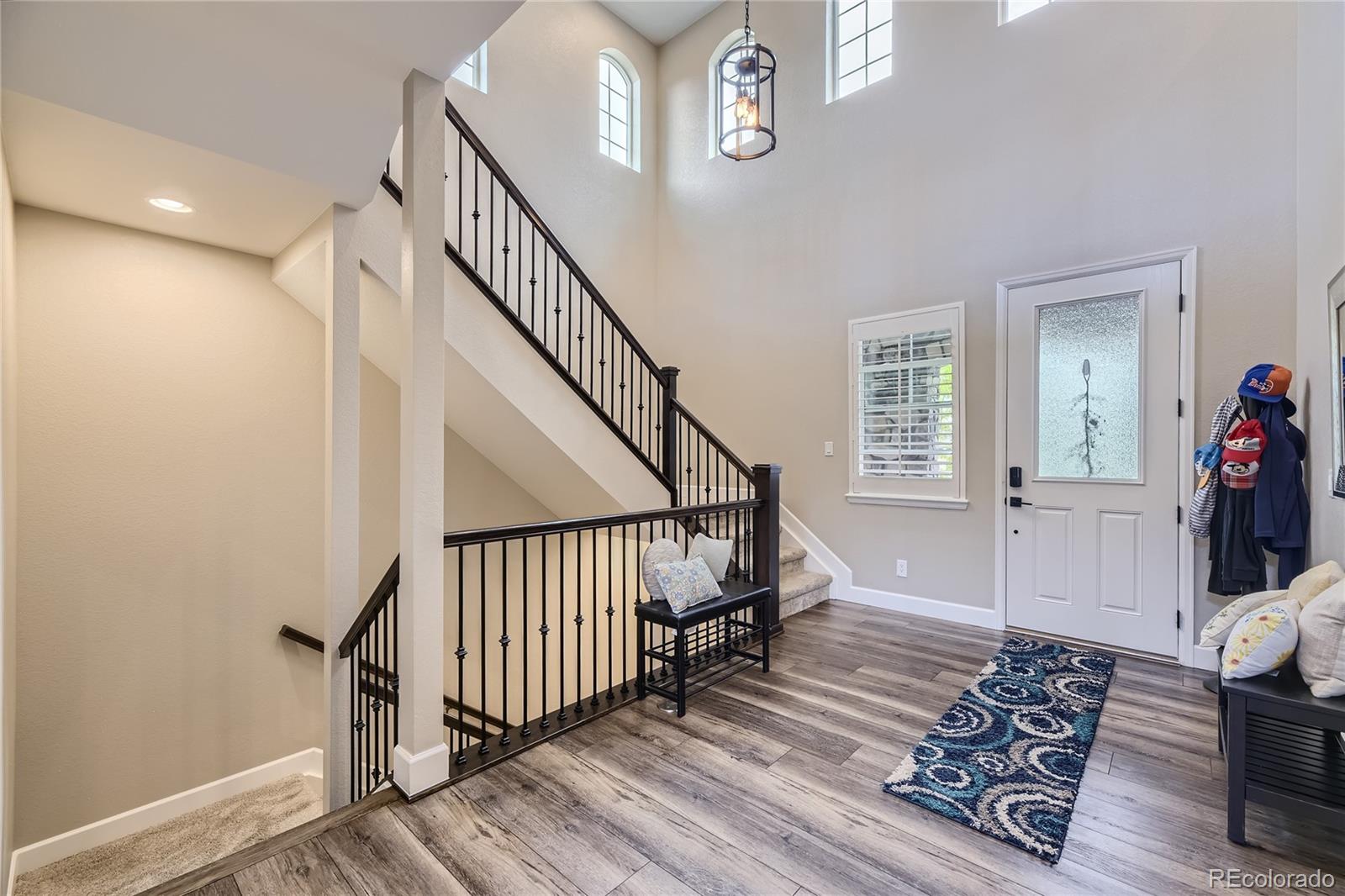 11330 Yellow Tip Point Parker, CO 80134 - Photo 6 of 50 a view of entryway with wooden floor