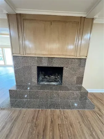 a living room with a fireplace