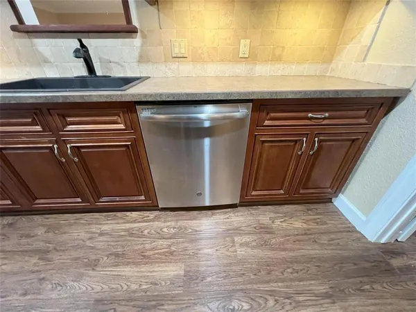 a view of room with washer and dryer