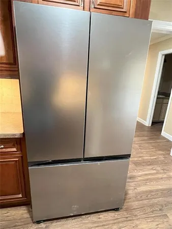 view of wooden floor cabinets