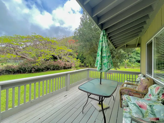 a view of a chairs in a balcony