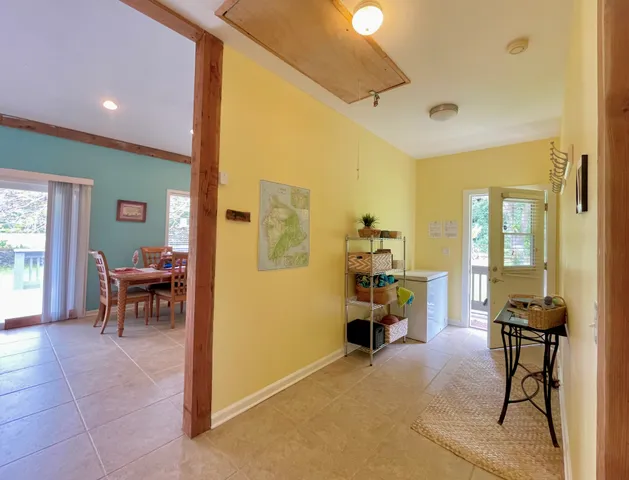 a view of living room with furniture and a flat screen tv