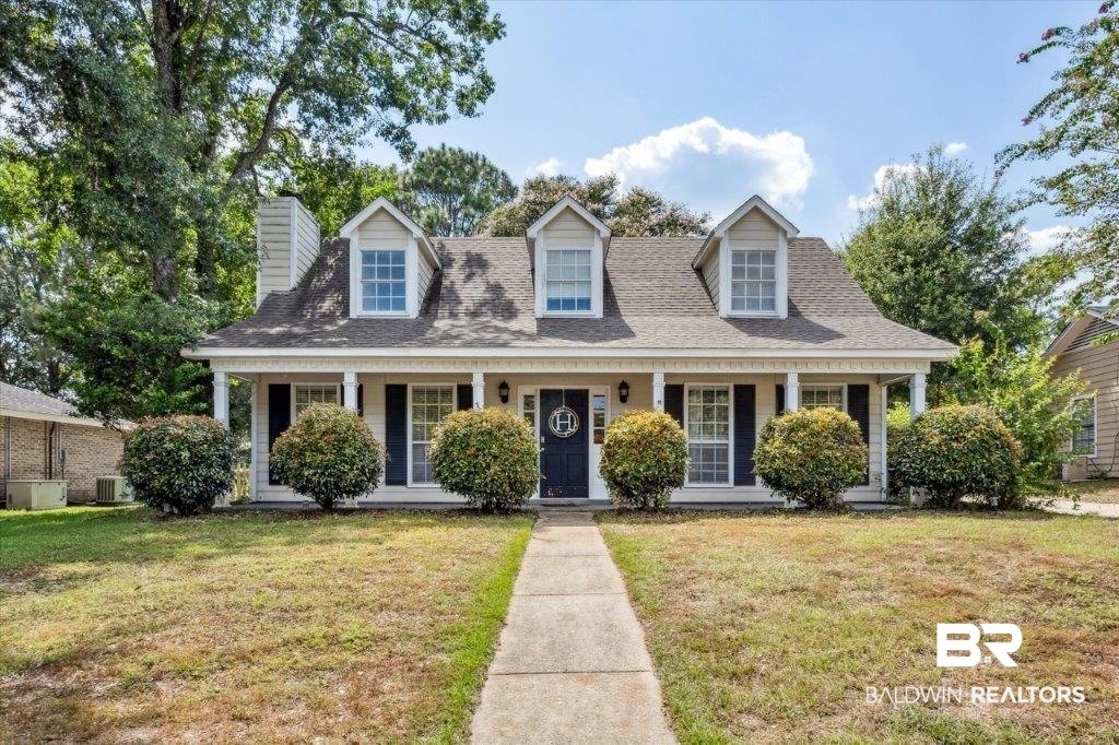 3616 Vista Ridge Drive Mobile, AL 36693 - Photo 1 of 20 New england style home with a front lawn