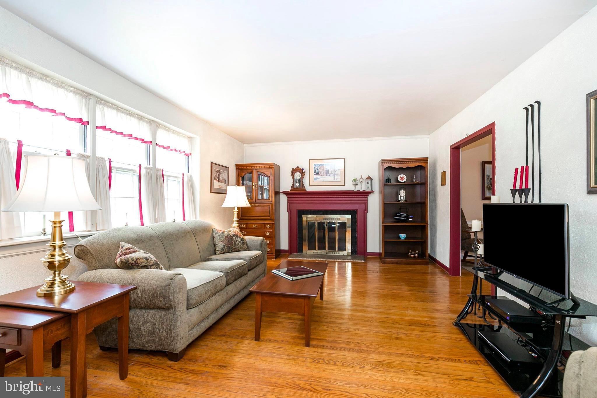790 Taylor Road Downingtown, PA 19335 - Photo 3 of 23 Spacious living area with wood burning fireplace