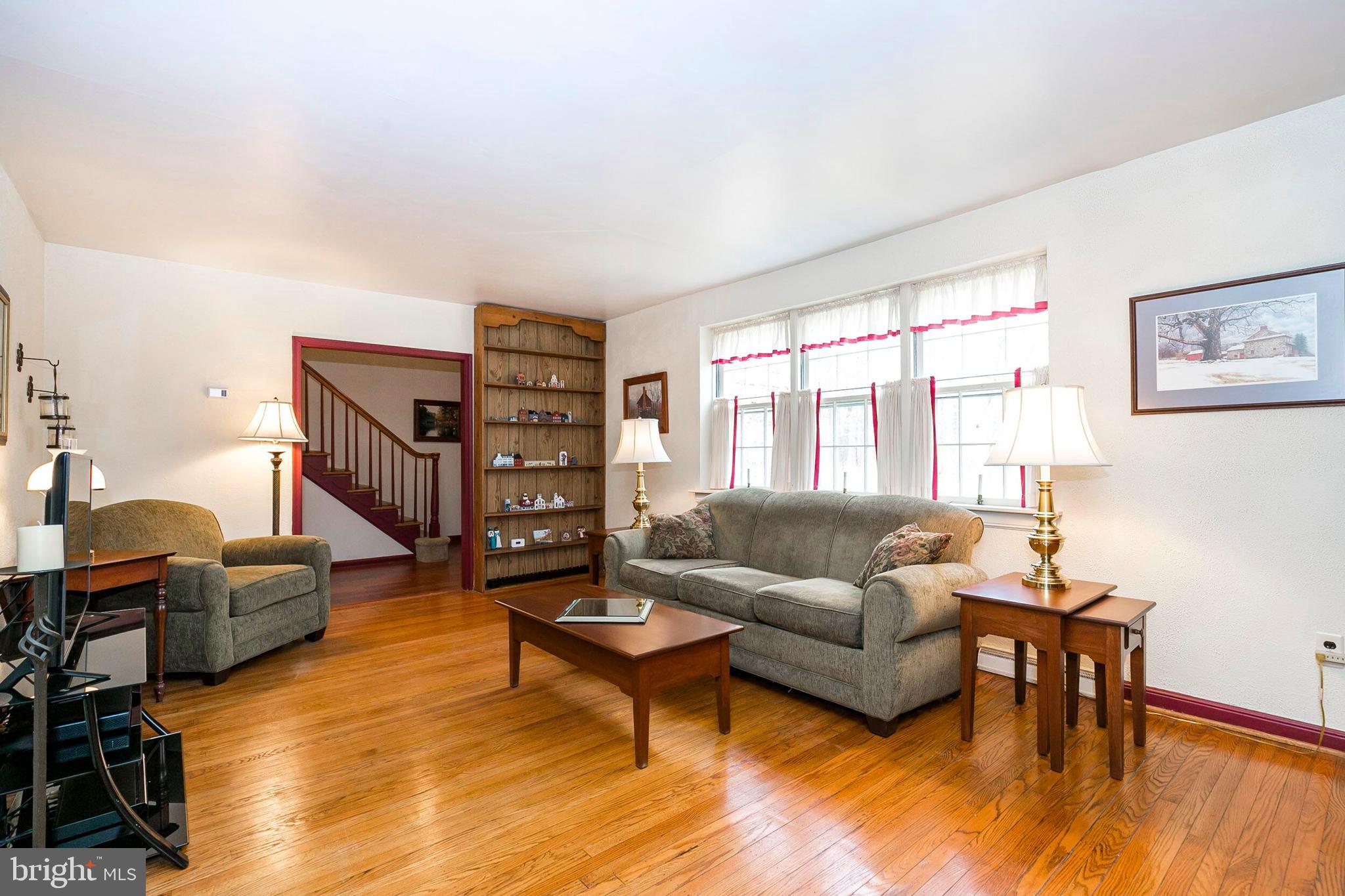 790 Taylor Road Downingtown, PA 19335 - Photo 5 of 23 Sunny living area off foyer