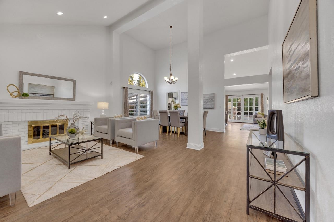 1747 Nursery Way Pleasanton, CA 94588 - Photo 15 of 50 a living room with furniture and a fireplace