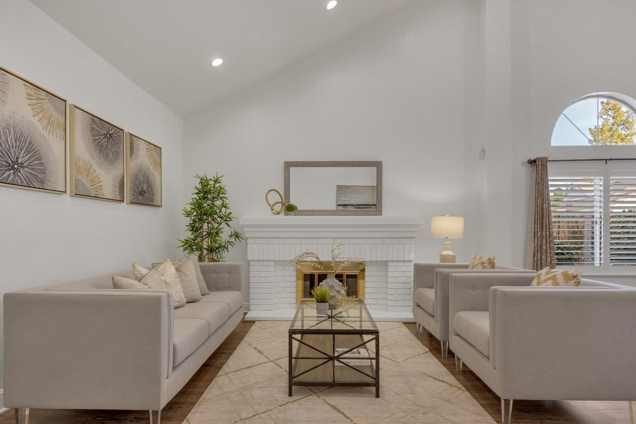 1747 Nursery Way Pleasanton, CA 94588 - Photo 16 of 50 a living room with furniture and a fireplace