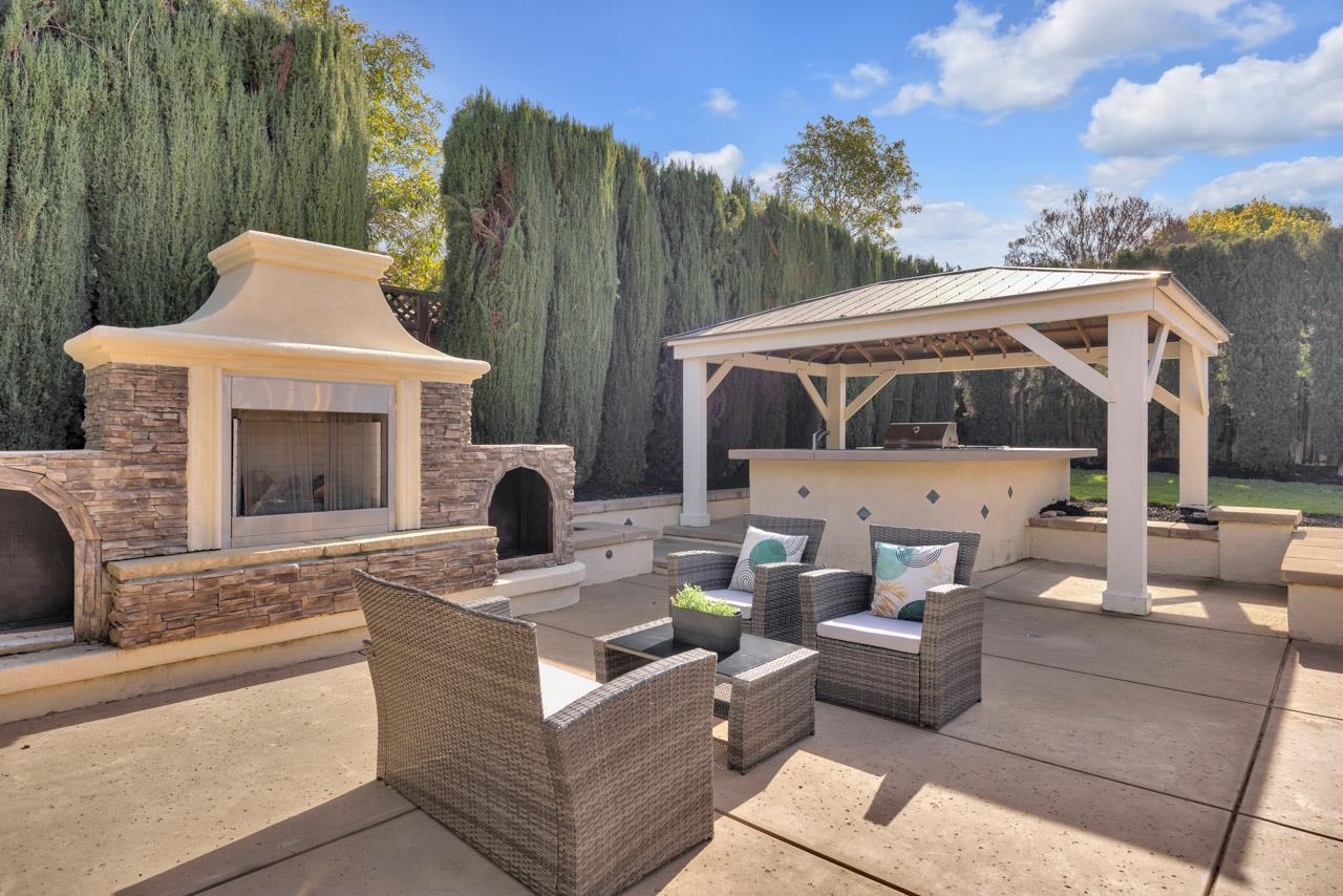 1747 Nursery Way Pleasanton, CA 94588 - Photo 43 of 50 a view of a patio with couches chairs and a fire pit