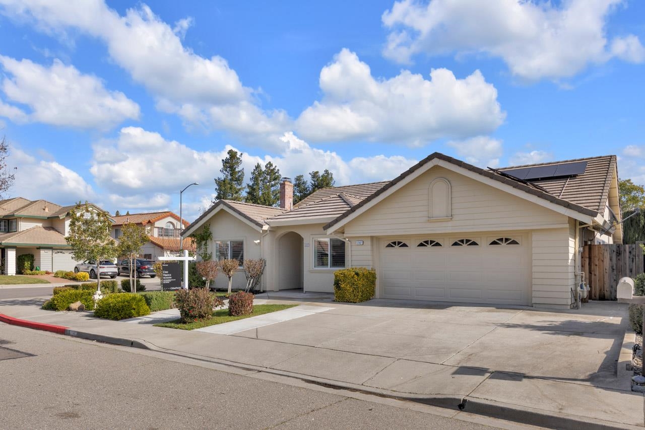 1747 Nursery Way Pleasanton, CA 94588 - Photo 6 of 50 a front view of a house with a garden