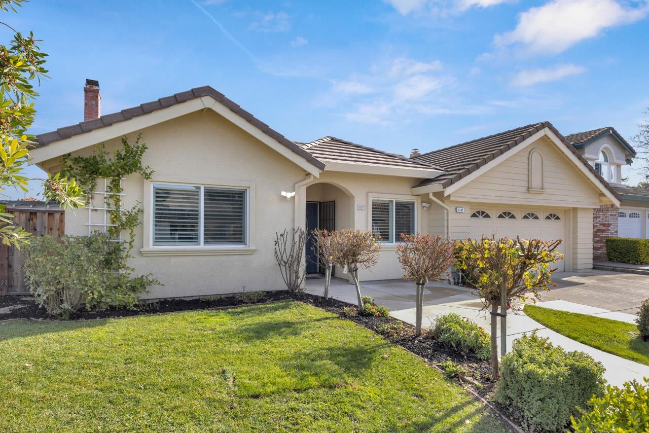 1747 Nursery Way Pleasanton, CA 94588 - Photo 9 of 50 a front view of a house with garden