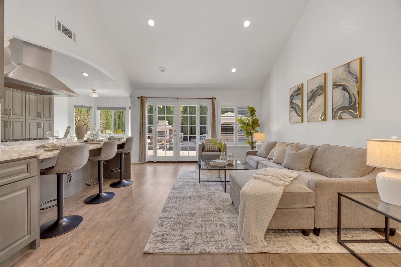 1747 Nursery Way Pleasanton, CA 94588 - Photo 10 of 50 a living room with furniture large window and wooden floor