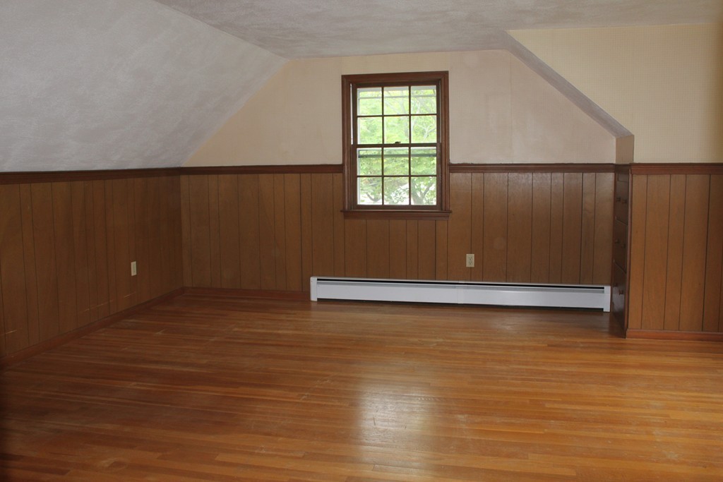 13 Haverhill Road Topsfield, MA 01983 - Photo 16 of 20 a view of a room with wooden floor and windows