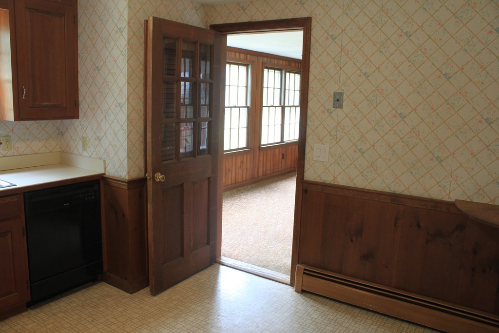 13 Haverhill Road Topsfield, MA 01983 - Photo 7 of 20 an empty room with wooden floor and windows