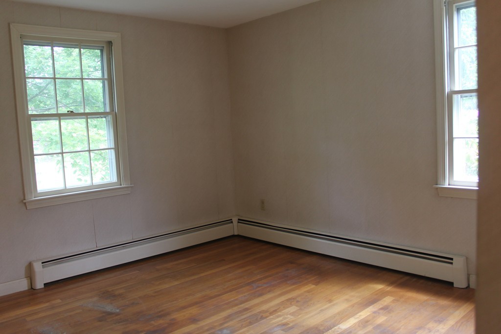 13 Haverhill Road Topsfield, MA 01983 - Photo 9 of 20 an empty room with a window