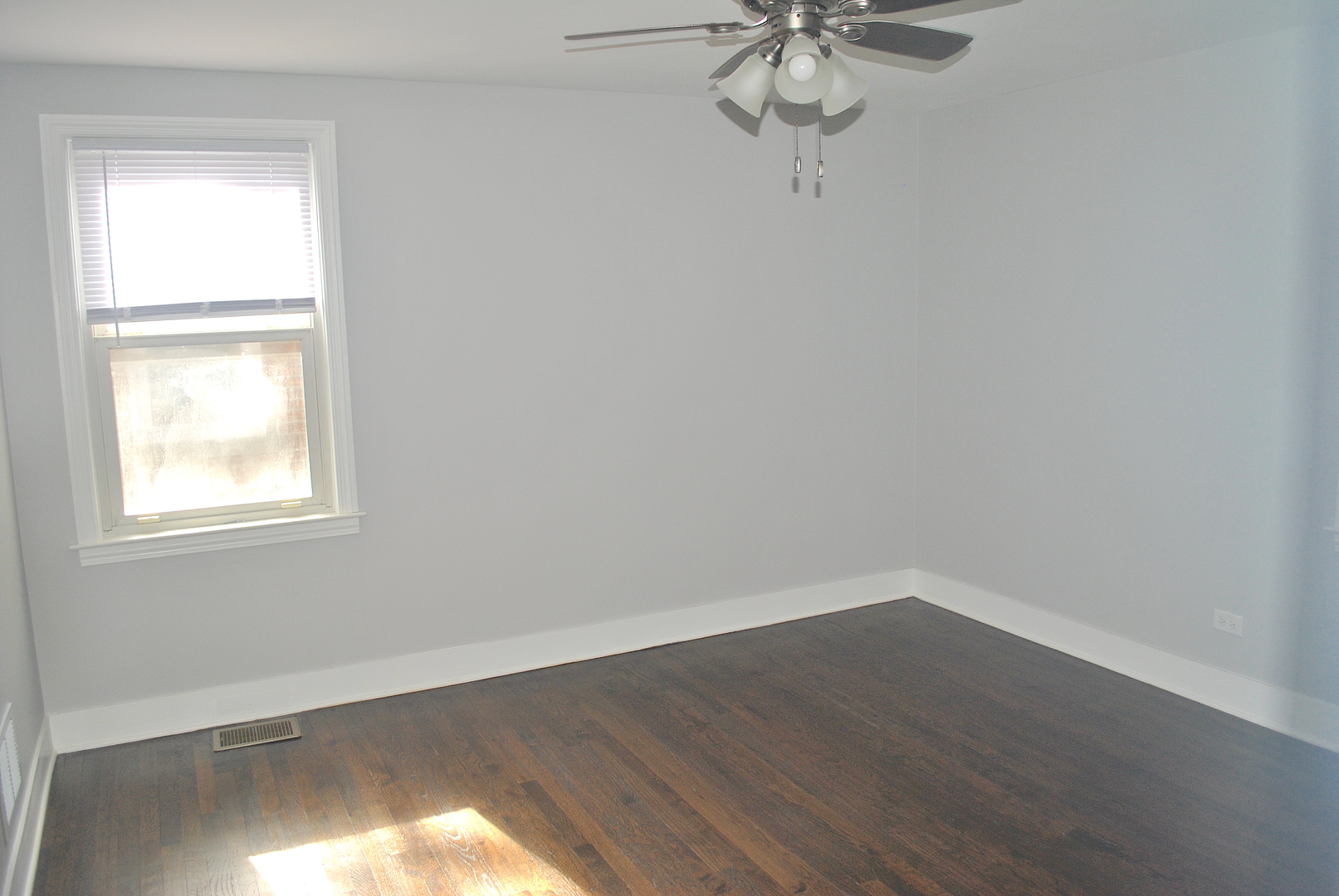 10052 South Green Street Chicago, IL 60643 - Photo 13 of 22 a view of a small space with wooden floor and a window