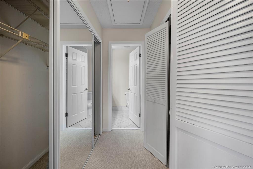 4761 Southeast Binnacle Way, Unit 108 Stuart, FL 34997 - Photo 17 of 43 a view of a hallway