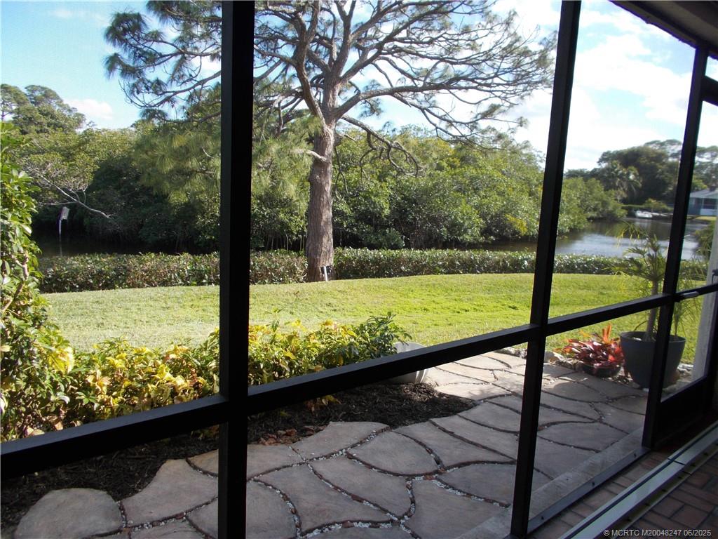4761 Southeast Binnacle Way, Unit 108 Stuart, FL 34997 - Photo 2 of 43 a view of lake from a balcony