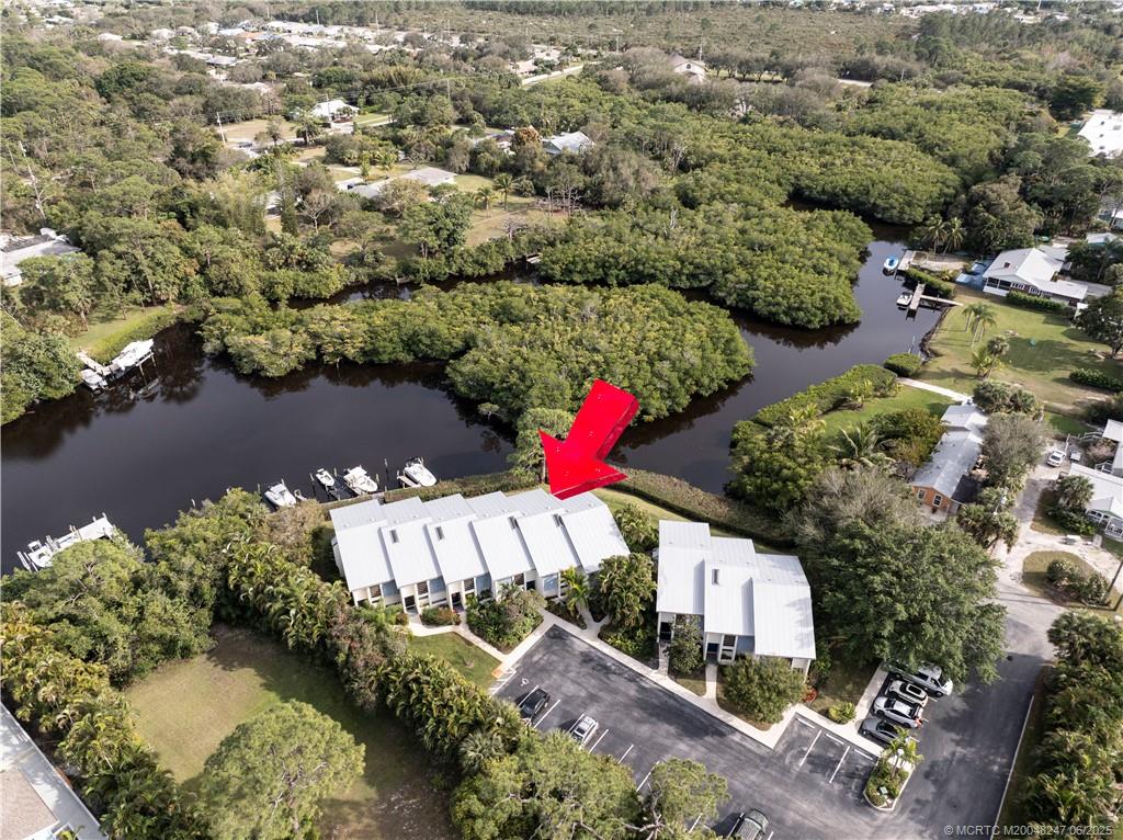 4761 Southeast Binnacle Way, Unit 108 Stuart, FL 34997 - Photo 30 of 43 an aerial view of residential houses with outdoor space