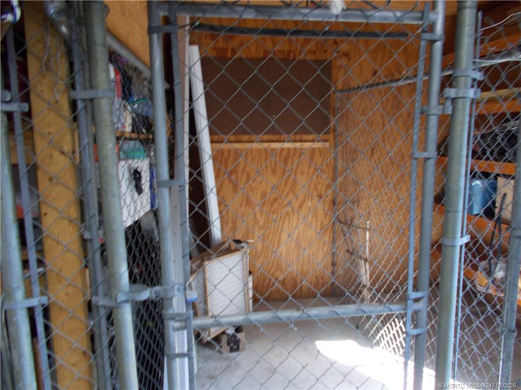 4761 Southeast Binnacle Way, Unit 108 Stuart, FL 34997 - Photo 39 of 43 a view of walk in closet with clothes