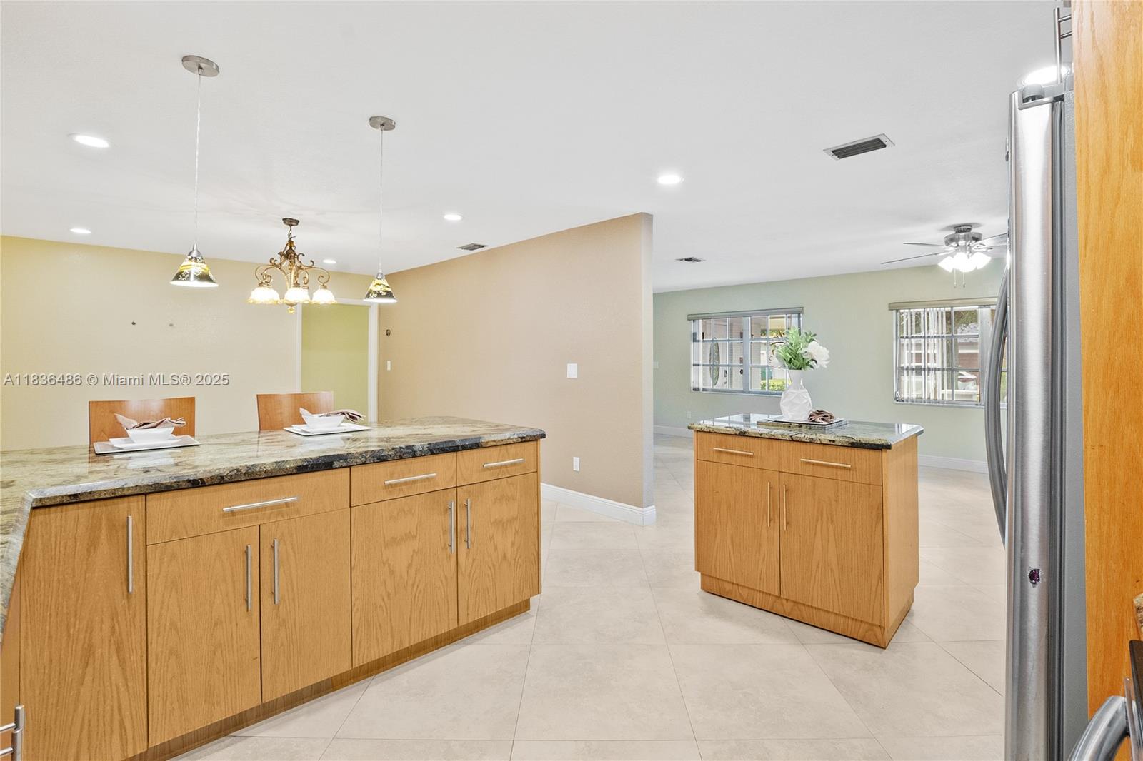 180 Southwest 125th Avenue Plantation, FL 33325 - Photo 11 of 29 a large bathroom with a sink a mirror and a bathtub