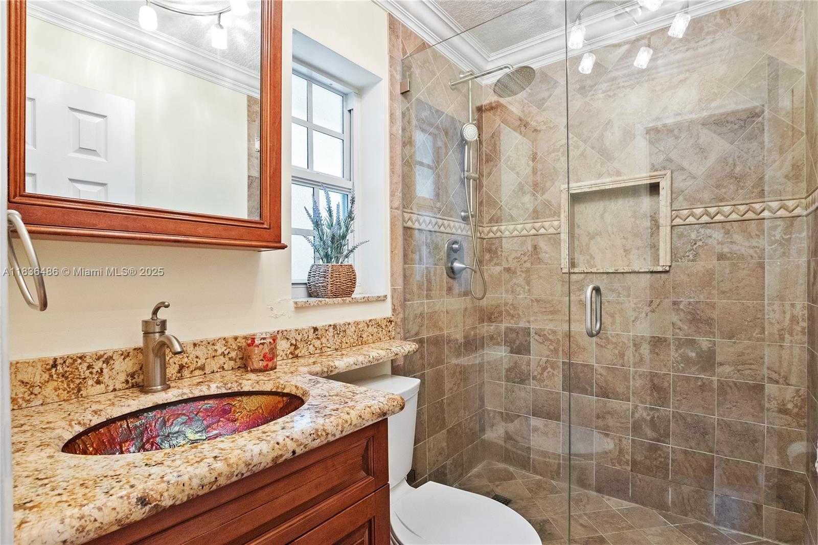 180 Southwest 125th Avenue Plantation, FL 33325 - Photo 14 of 29 a bathroom with a granite countertop sink toilet and shower