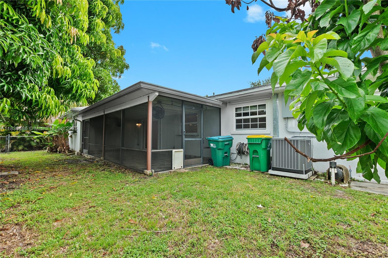 180 Southwest 125th Avenue Plantation, FL 33325 - Photo 27 of 29 a view of a house with backyard and a tree