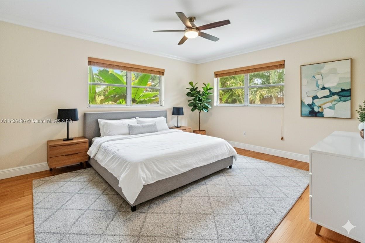180 Southwest 125th Avenue Plantation, FL 33325 - Photo 3 of 29 a bedroom with a bed and a window