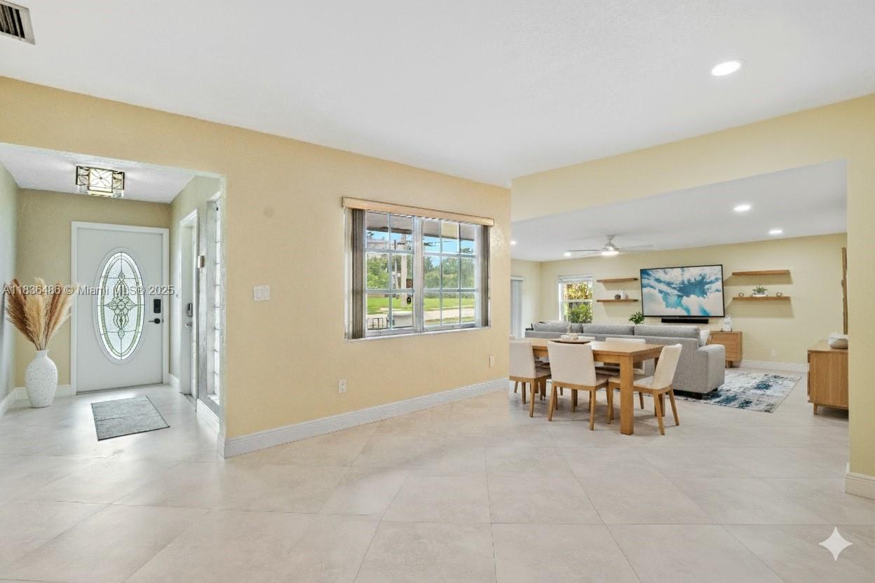 180 Southwest 125th Avenue Plantation, FL 33325 - Photo 5 of 29 a view of a livingroom with furniture and window