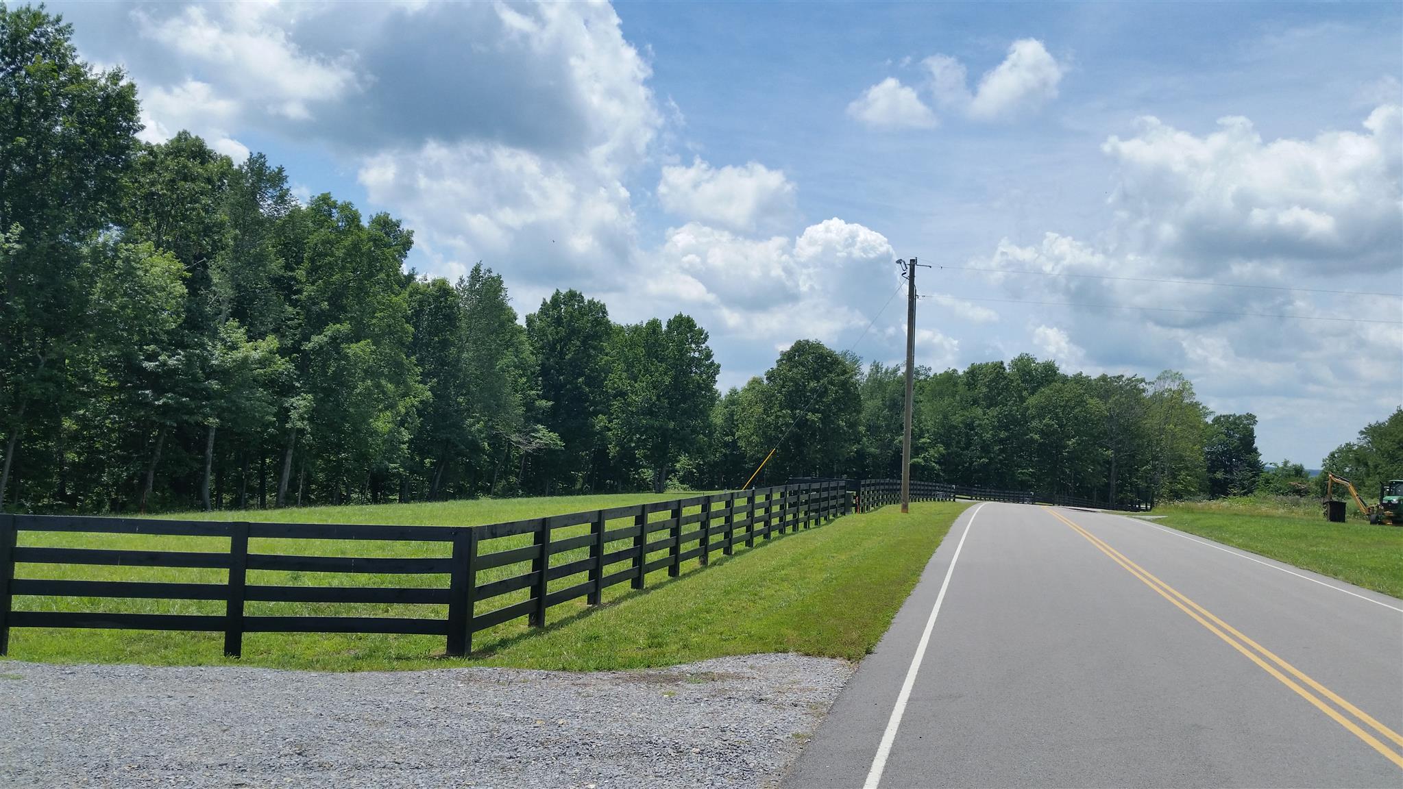 5 Liberty Road Fairview, TN 37062 - Photo 4 of 8 a view of a green field with wooden fence