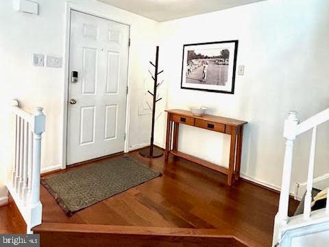 28 Flintlock Lane Chesterbrook, PA 19087 - Photo 11 of 69 a view of an entryway with wooden floor