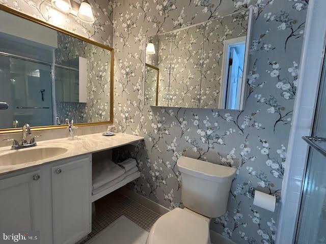 28 Flintlock Lane Chesterbrook, PA 19087 - Photo 22 of 69 a bathroom with a toilet sink and mirror