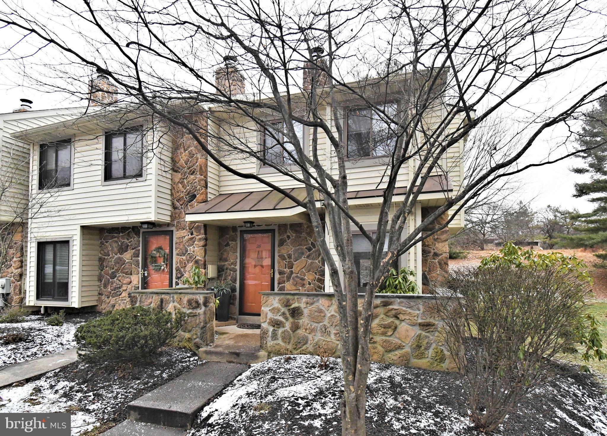 28 Flintlock Lane Chesterbrook, PA 19087 - Photo 3 of 69 a front view of a house with garden