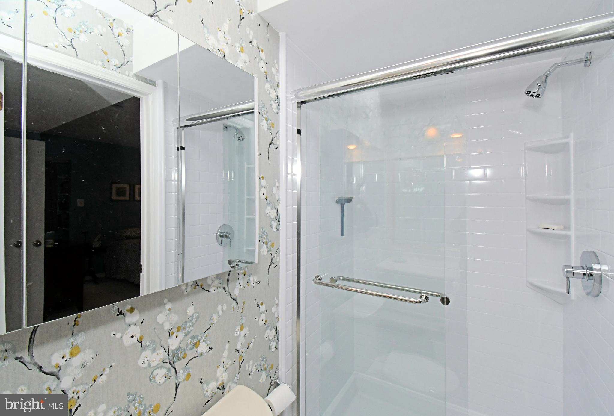 28 Flintlock Lane Chesterbrook, PA 19087 - Photo 57 of 69 a bathroom with a shower and a sink