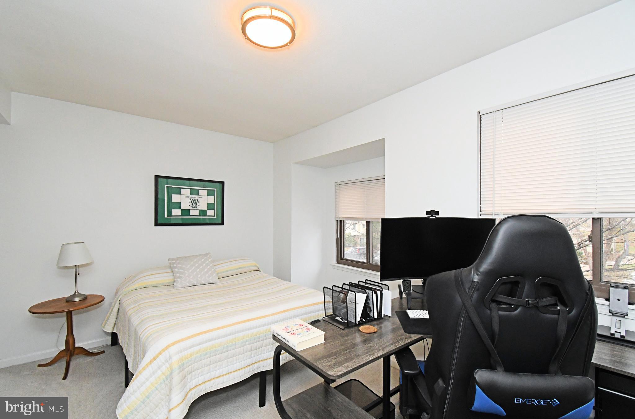 28 Flintlock Lane Chesterbrook, PA 19087 - Photo 60 of 69 a bedroom with a bed and a table