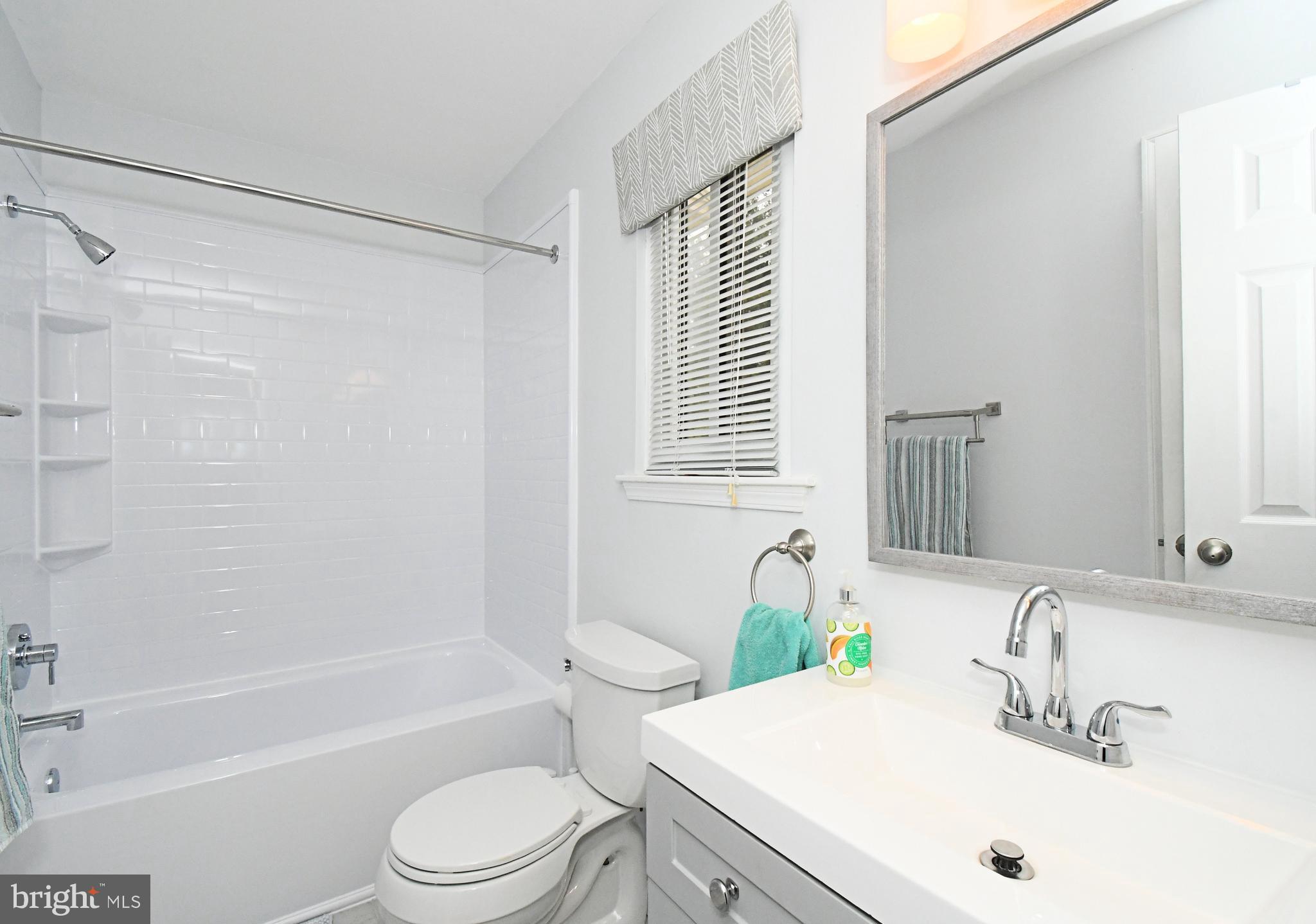 28 Flintlock Lane Chesterbrook, PA 19087 - Photo 66 of 69 a bathroom with a sink toilet and shower