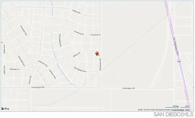 a picture of a bathroom with a shower