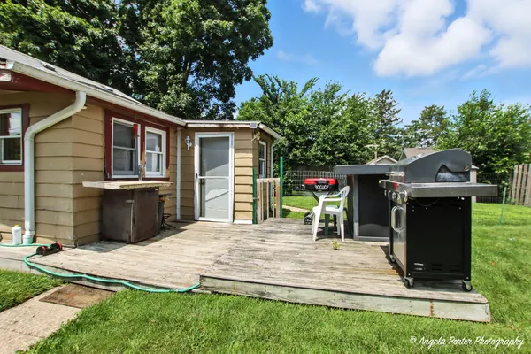 a view of a backyard with a patio