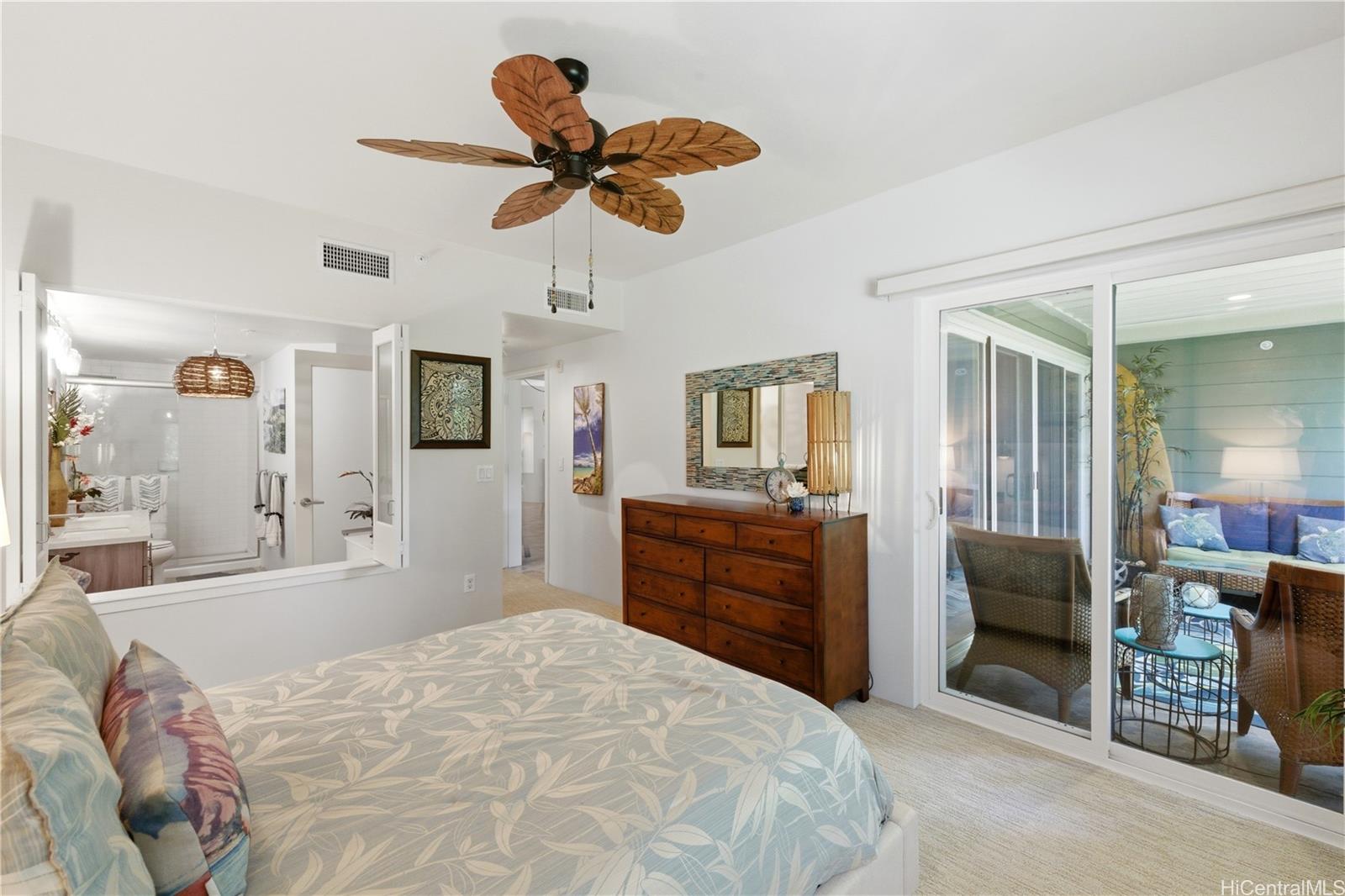 437 Kailua Road, Unit 6108 Kailua, HI 96734 - Photo 16 of 25 Ample wall space allows for additional storage, while the sliding glass door to the lanai opens the room with natural light and fresh air.